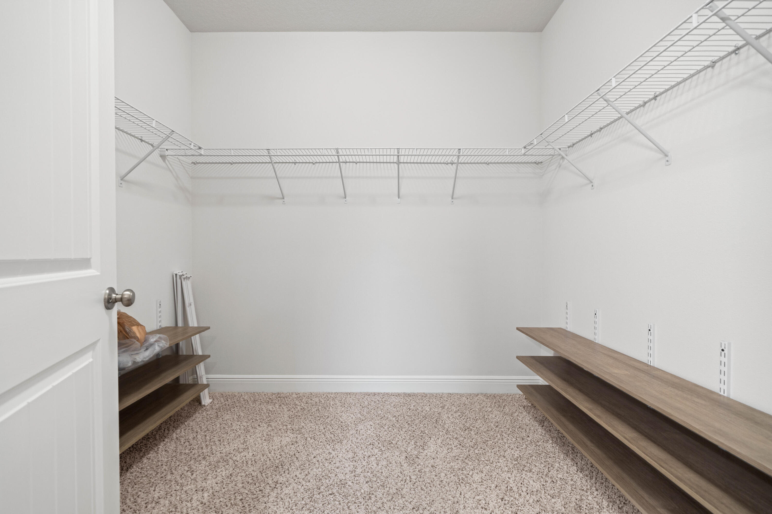521 Cornelia Street Freeport, FL 32439 - Photo 24 of 39 a view of a room with racks on the wall