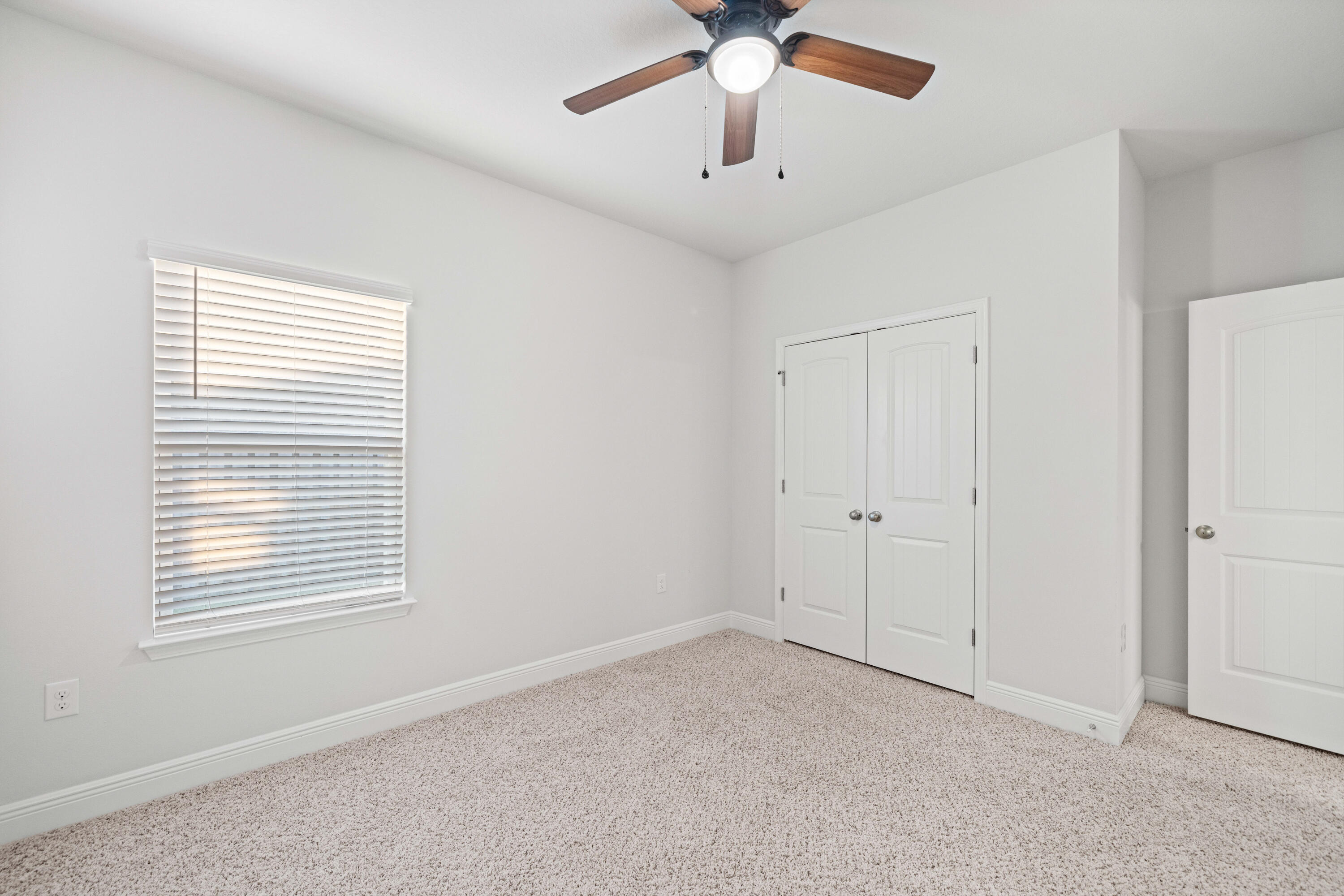 521 Cornelia Street Freeport, FL 32439 - Photo 25 of 39 a view of an empty room with a window