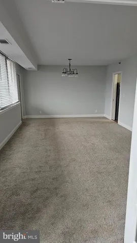 a view of a livingroom with a staircase