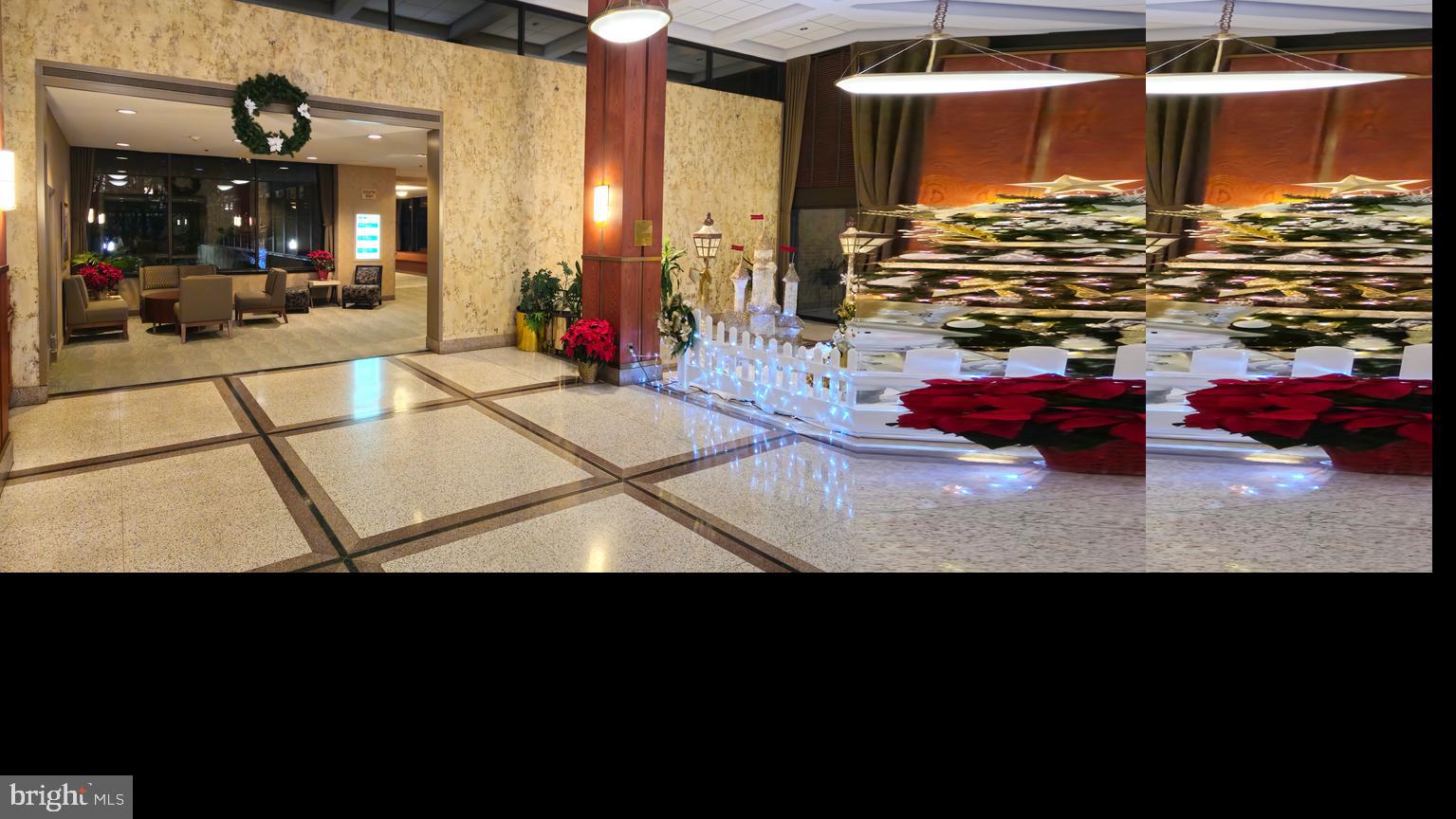 5501 Seminary Road, Unit 2502S Falls Church, VA 22041 - Photo 19 of 32 a living room with table or chairs and a umbrella