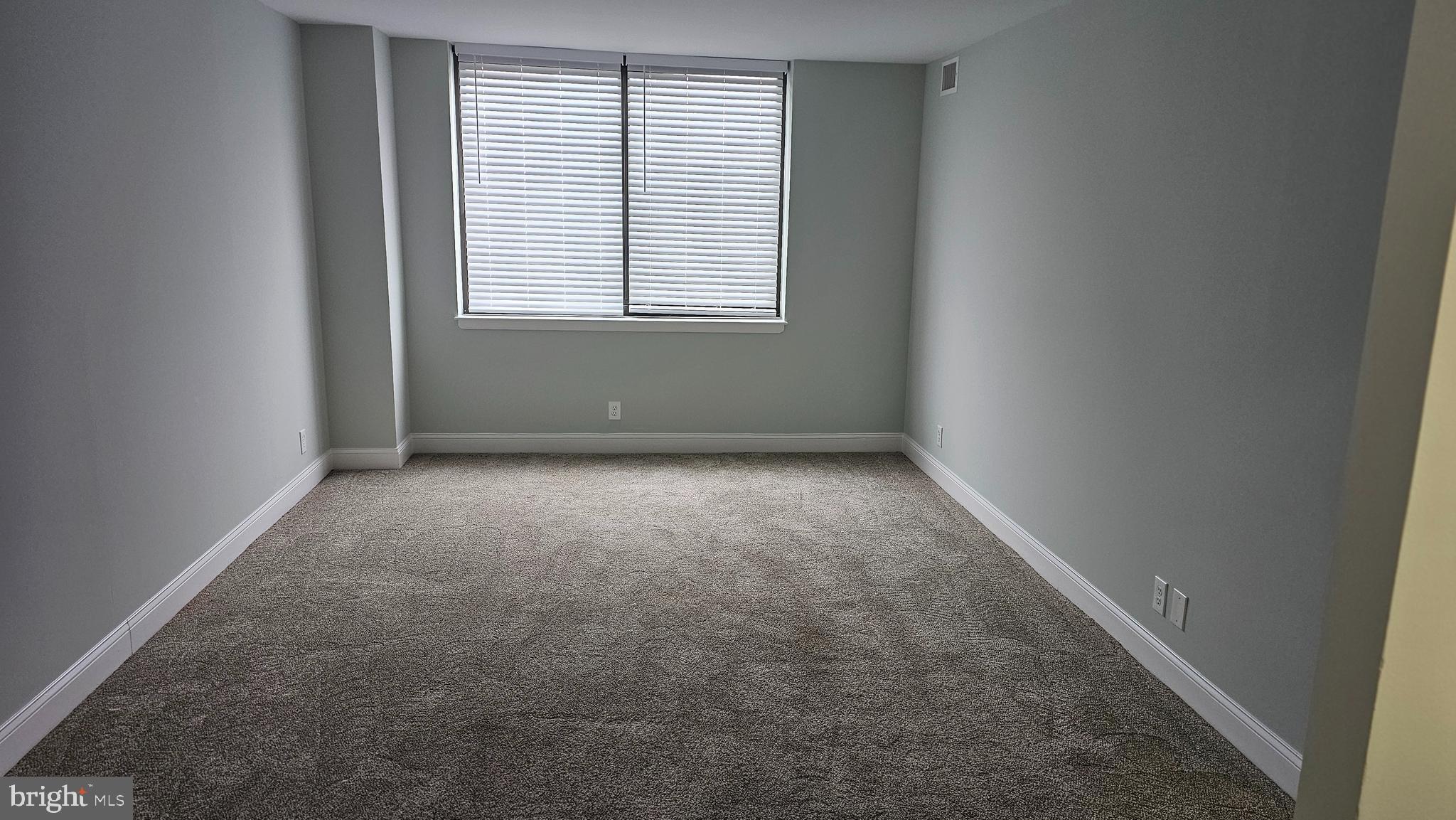 5501 Seminary Road, Unit 2502S Falls Church, VA 22041 - Photo 4 of 32 an empty room with a window