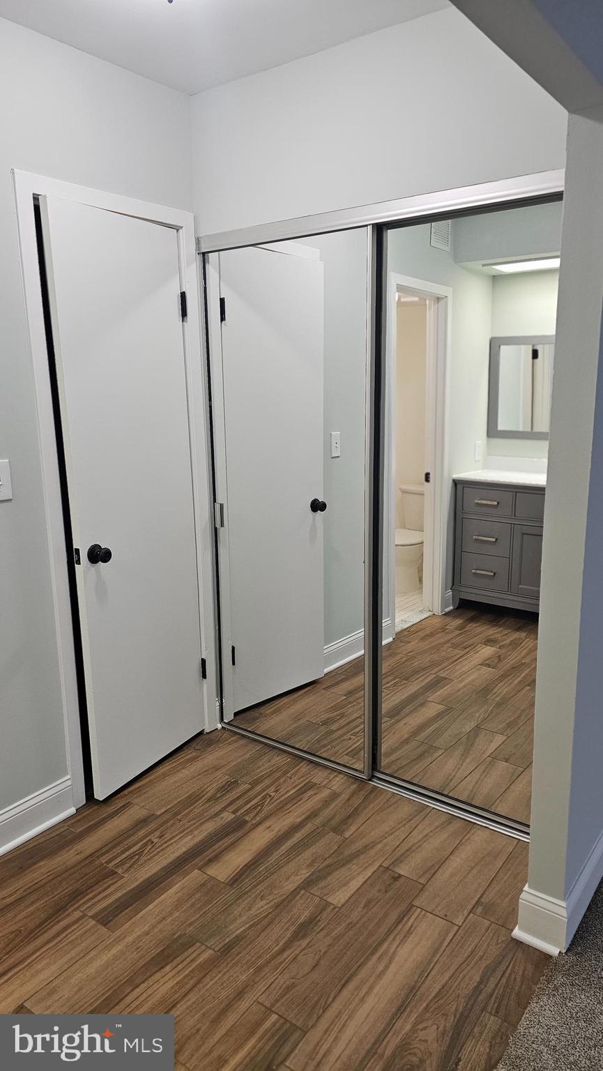 5501 Seminary Road, Unit 2502S Falls Church, VA 22041 - Photo 7 of 32 a view of a room with wooden floor and bathroom
