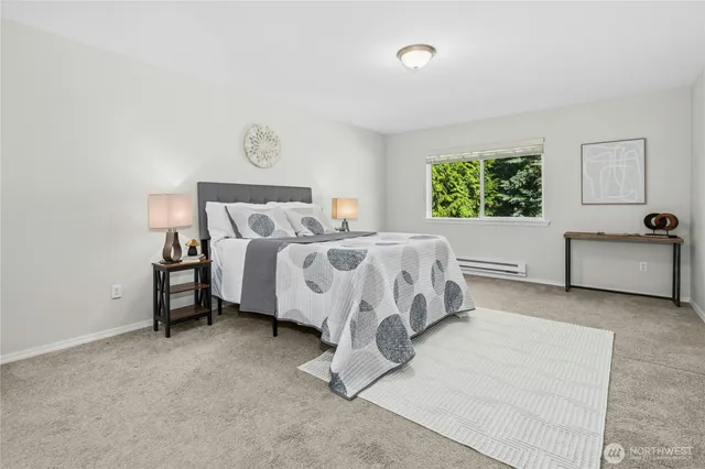 a bed room with a bed and a couch