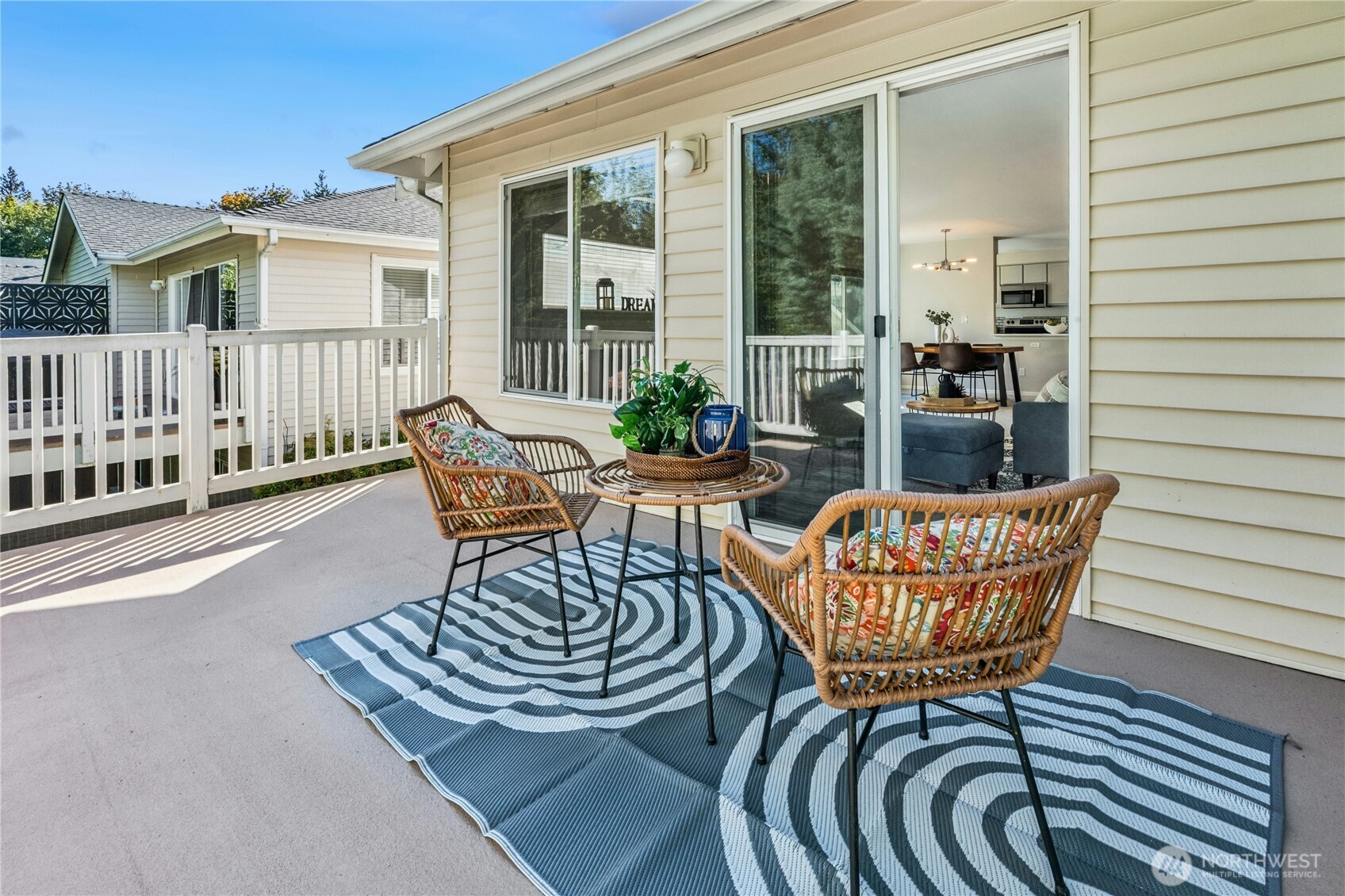 725 115th Street Southwest, Unit BB 204 Everett, WA 98204 - Photo 23 of 32 a view of a chairs with barbeque grill and wooden floor