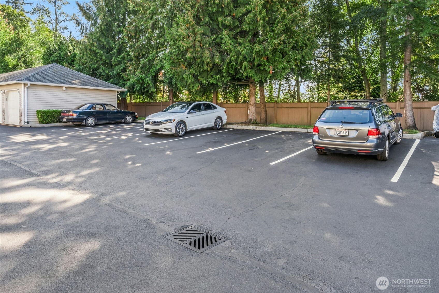 725 115th Street Southwest, Unit BB 204 Everett, WA 98204 - Photo 28 of 32 a car parked in front of a house