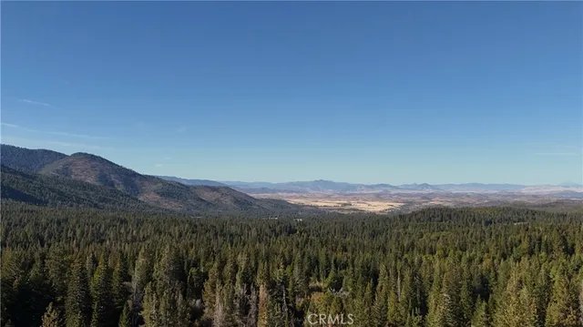 a view of a lush green mountain