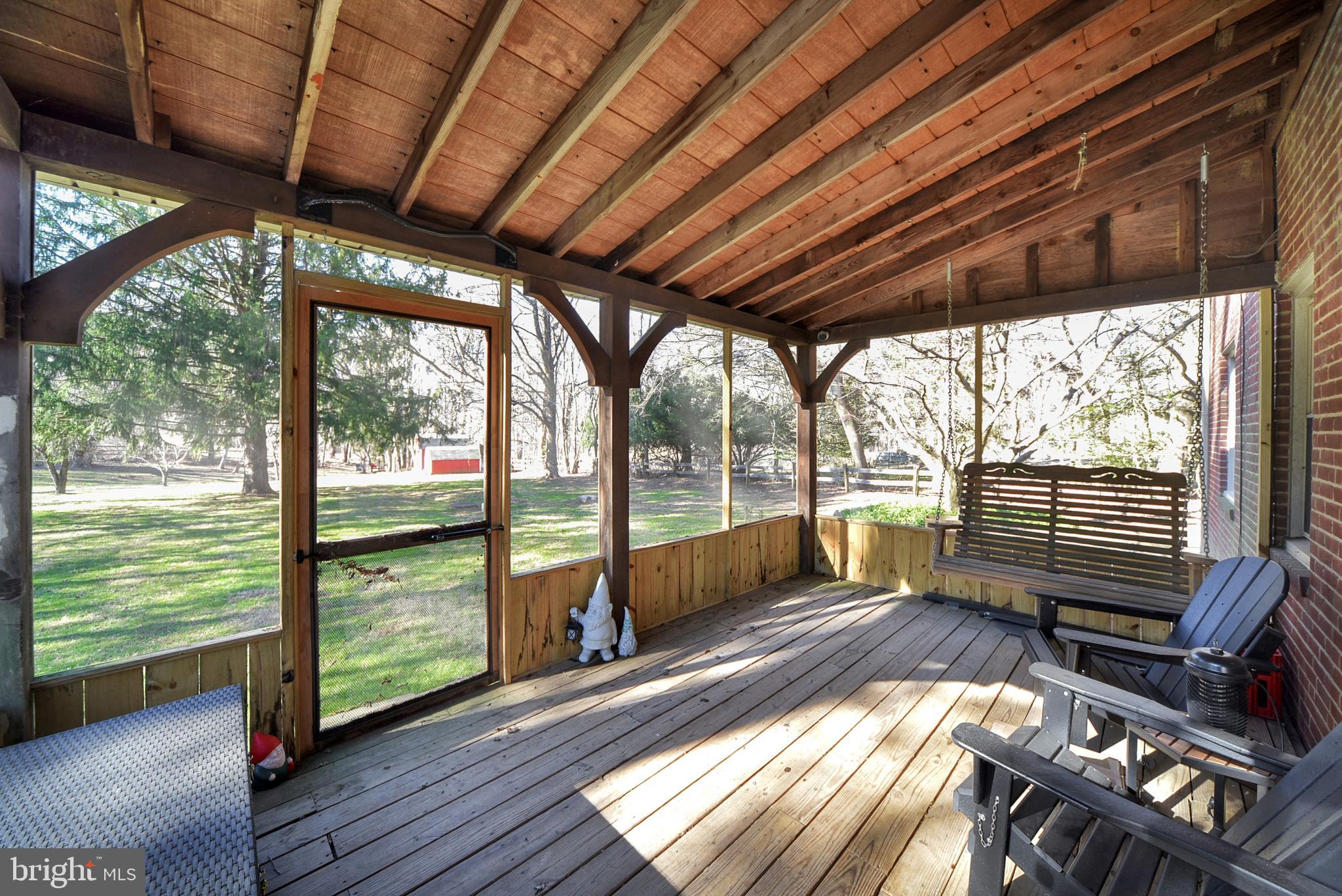 12232 Dover Road Reisterstown, MD 21136 - Photo 8 of 36 Screened in porch off of the kitchen