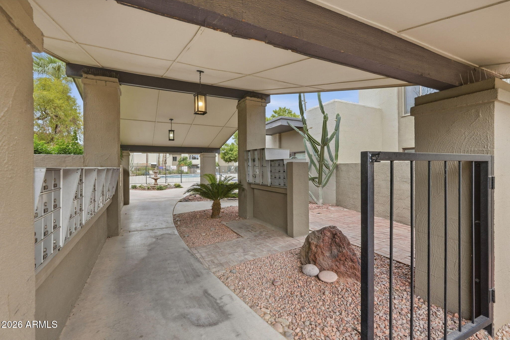 4201 East Camelback Road, Unit 41 Phoenix, AZ 85018 - Photo 23 of 26 Community Pool Entry Way