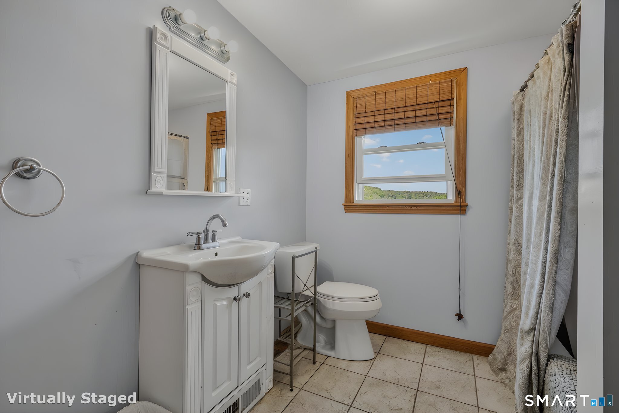 210 Shore Road Waterford, CT 06385 - Photo 24 of 26 a bathroom with a sink toilet and mirror