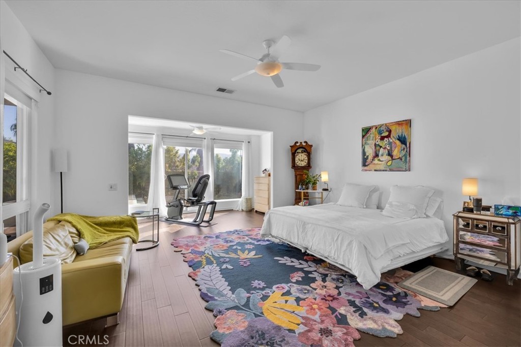 4 Oakmont Drive Rancho Mirage, CA 92270 - Photo 24 of 73 a living room with furniture and a large window