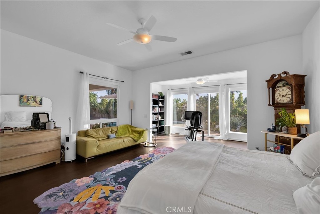 4 Oakmont Drive Rancho Mirage, CA 92270 - Photo 25 of 73 a bedroom with bed and window