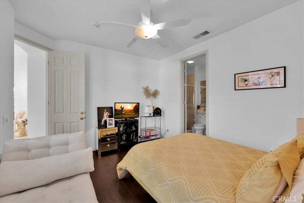 4 Oakmont Drive Rancho Mirage, CA 92270 - Photo 34 of 73 a bed room with a bed and a couch