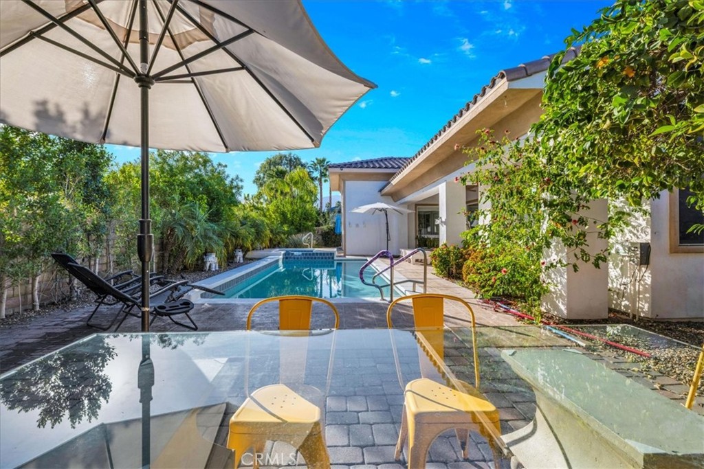 4 Oakmont Drive Rancho Mirage, CA 92270 - Photo 51 of 73 a view of a house with backyard and sitting area