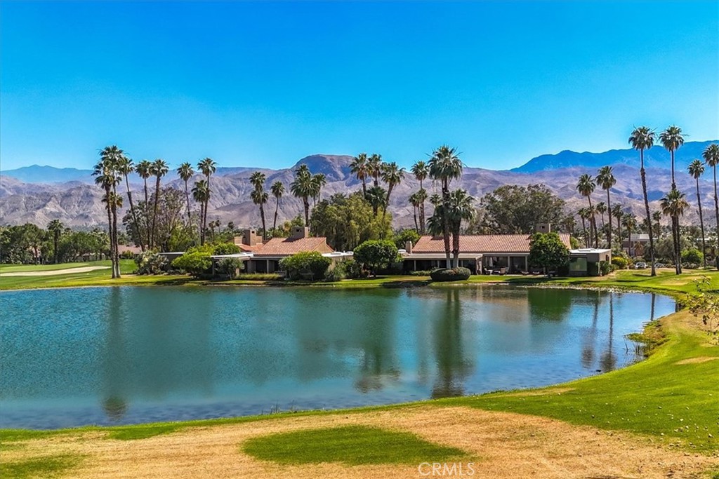 4 Oakmont Drive Rancho Mirage, CA 92270 - Photo 68 of 73 a view of a lake with houses