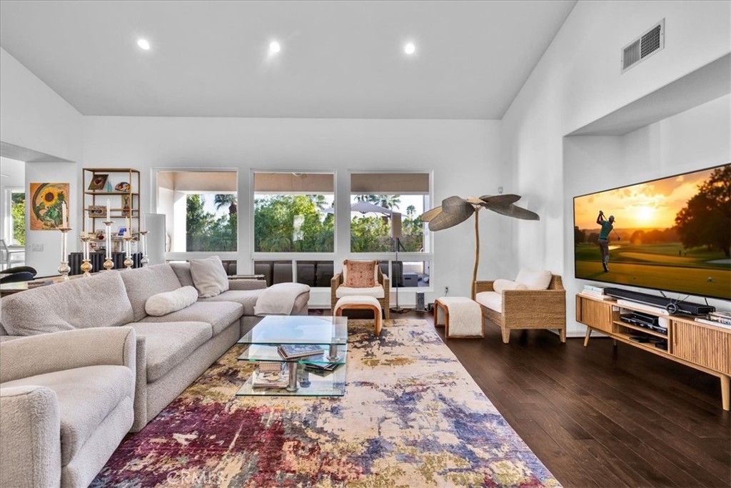 4 Oakmont Drive Rancho Mirage, CA 92270 - Photo 10 of 73 a living room with furniture and a flat screen tv