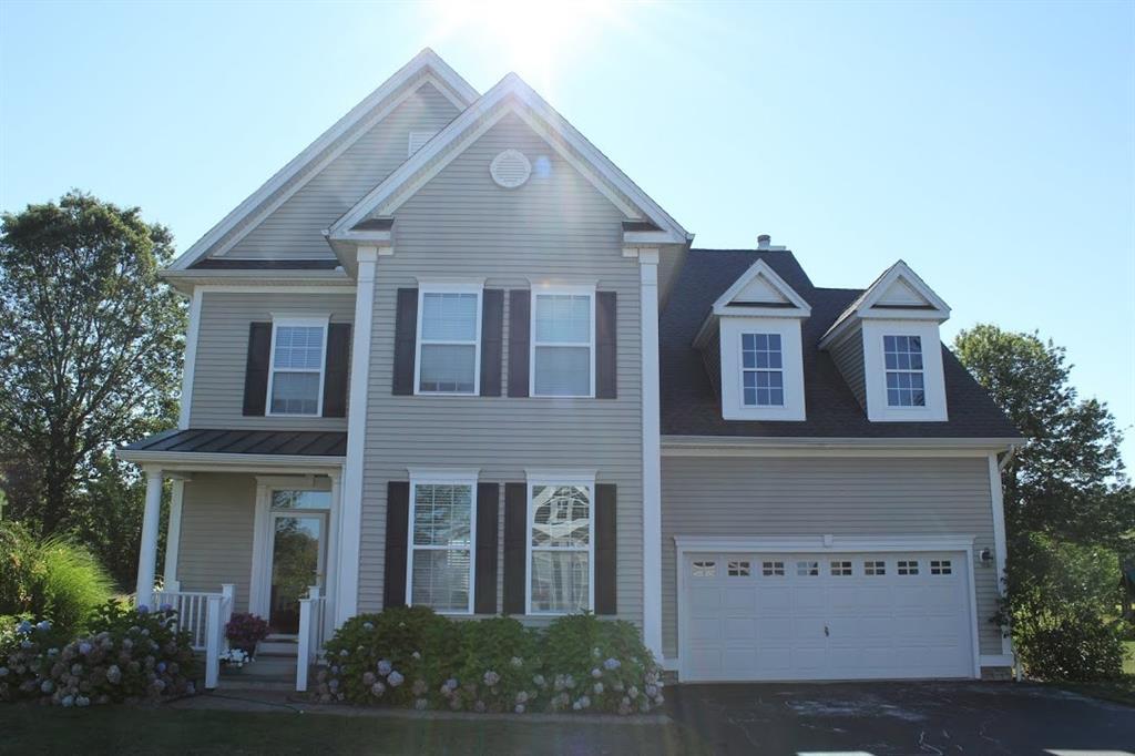 24 Broadmeadow Road, Unit 24 Wallingford, CT 06492 - Photo 1 of 1 a front view of a house with garden