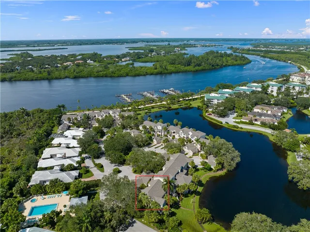an aerial view of a houses with outdoor space