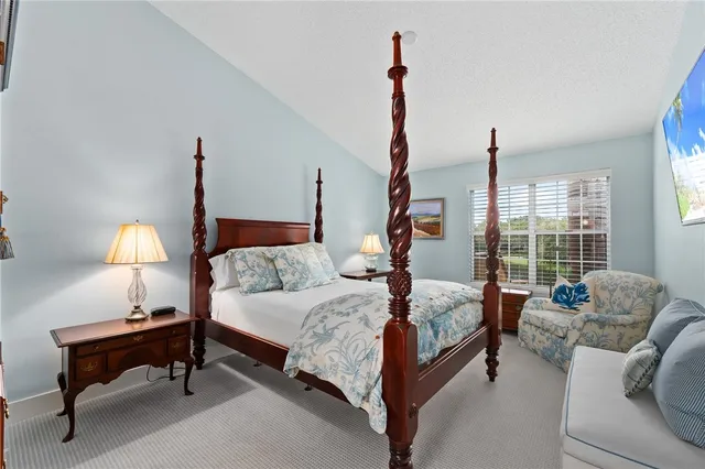 a bathroom with a mirror and a shower