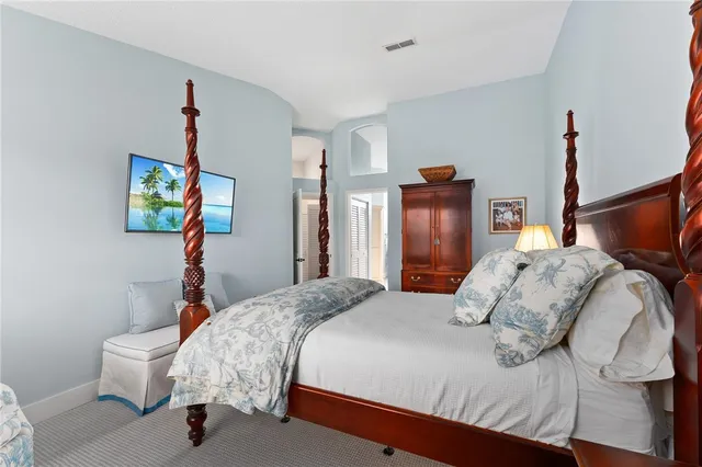 a spacious bathroom with a double vanity sink and a mirror