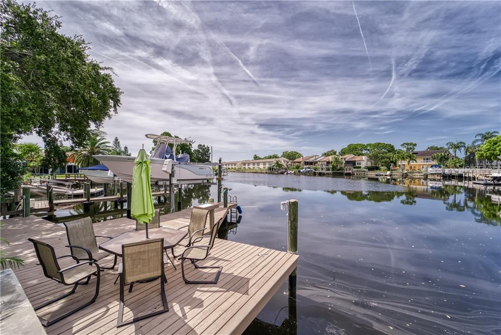 WHAT'S NOT TO LOVE ABOUT THIS HOME! LOOK AT THIS VIEW AT THE BACK END OF THE COVE AND ENDLESS BLUE WATER AND SKY!