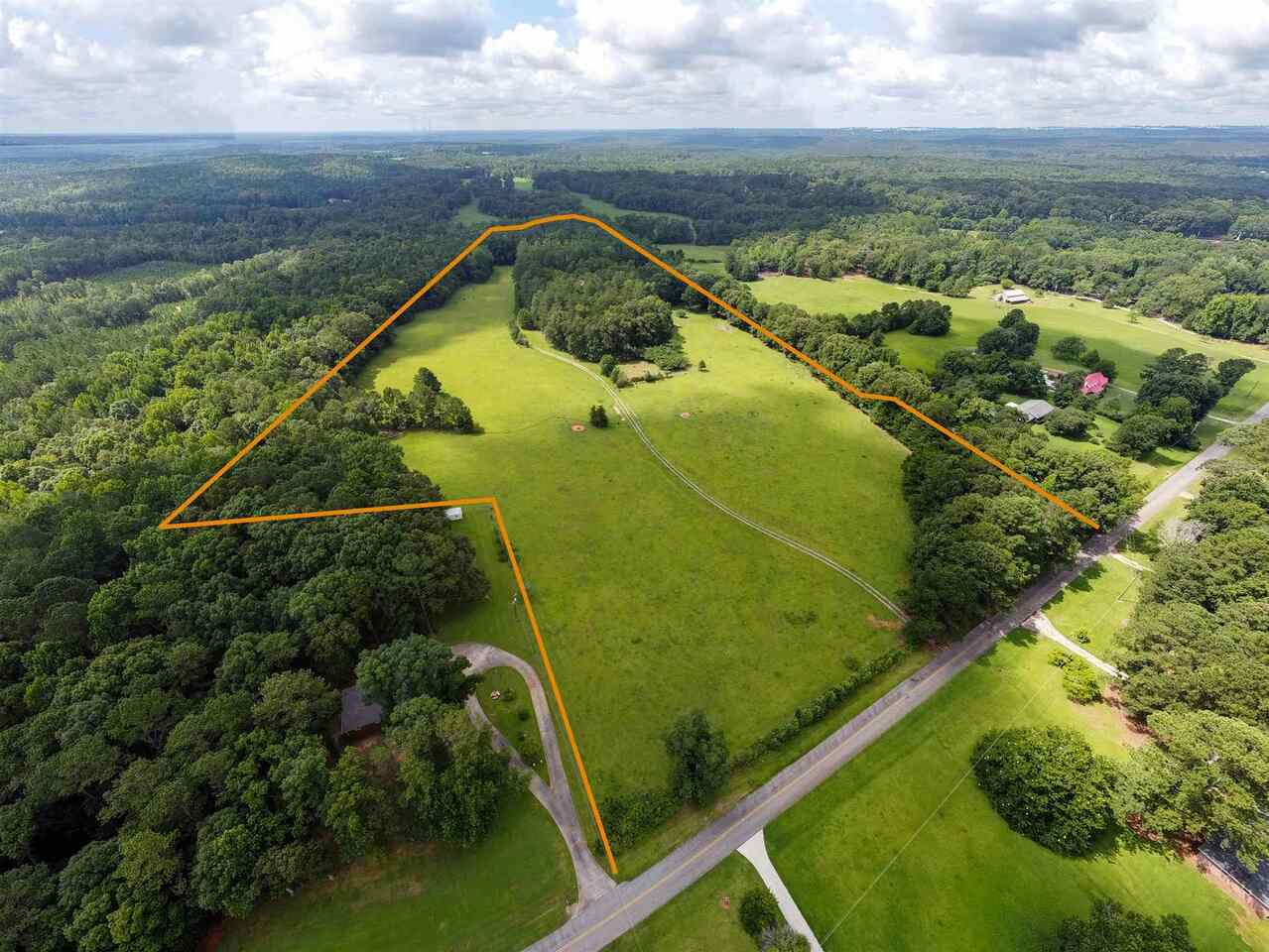 a view of a balcony with floor to ceiling windows