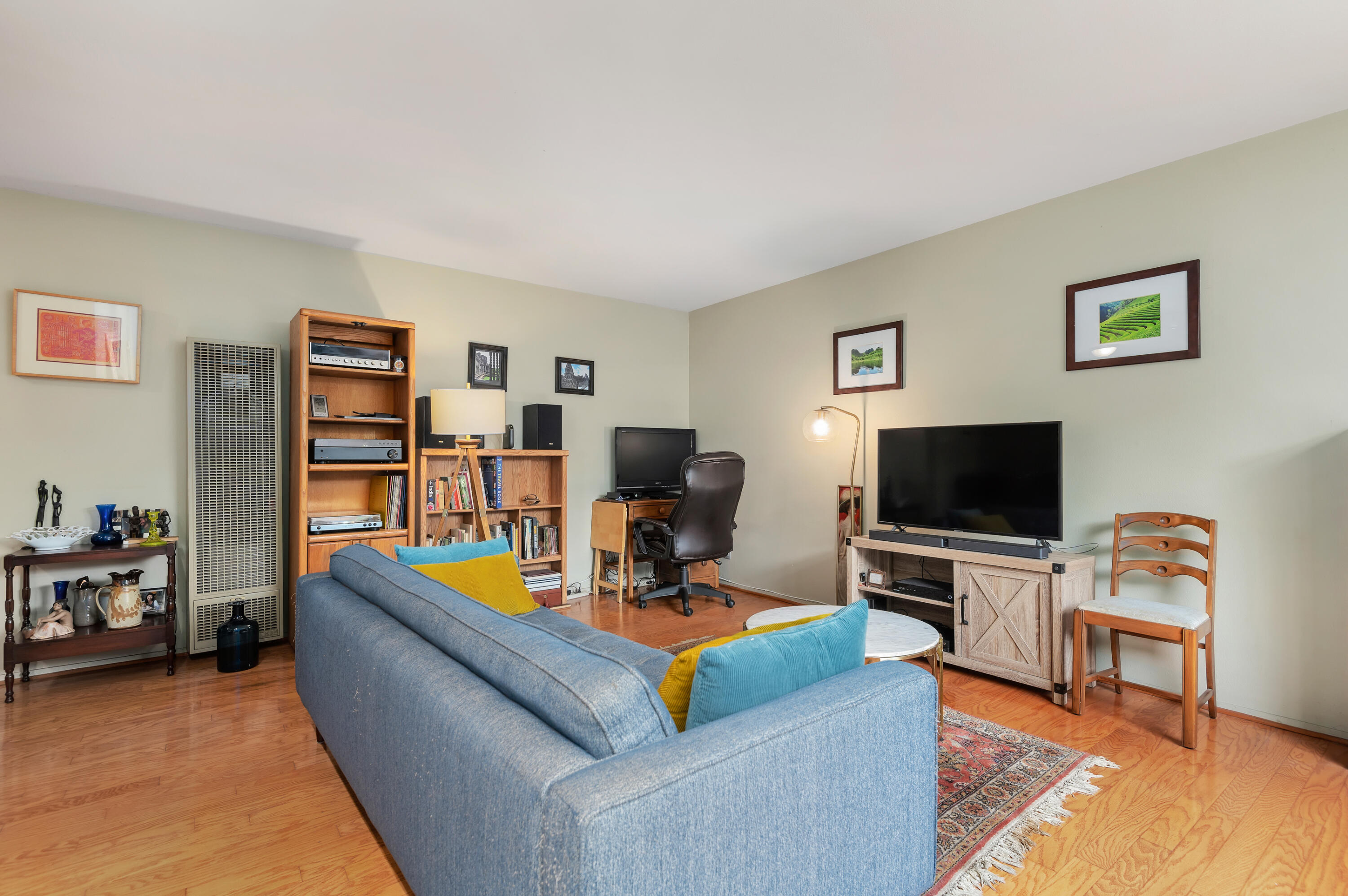 4344 Modoc Road, Unit 15 Santa Barbara, CA 93110 - Photo 3 of 19 a living room with furniture and a flat screen tv