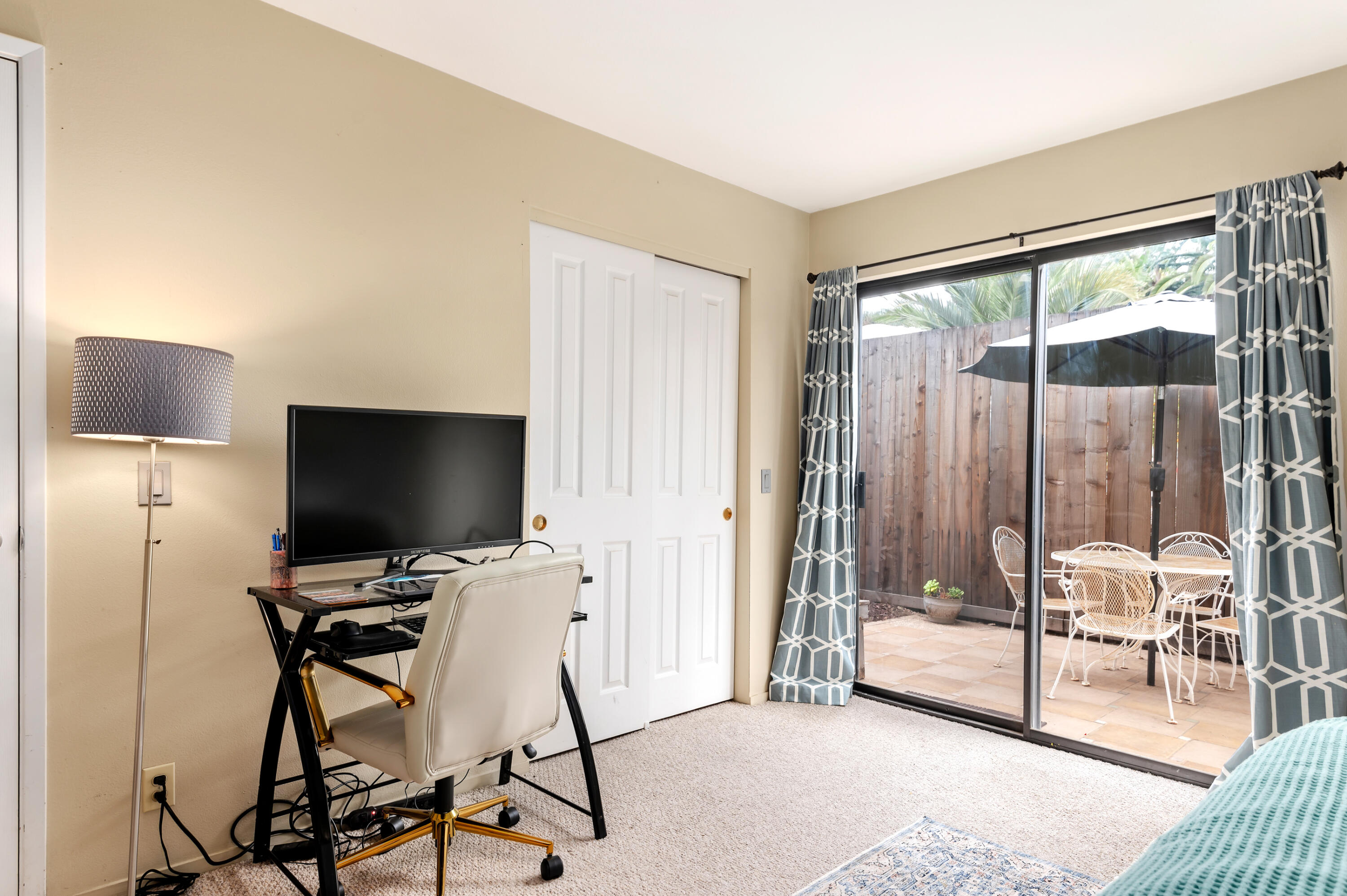 4344 Modoc Road, Unit 15 Santa Barbara, CA 93110 - Photo 10 of 19 a view of a livingroom with furniture and a flat screen tv