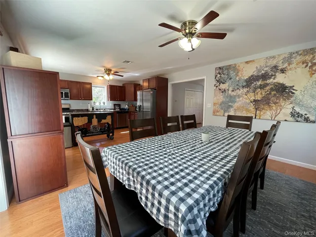 a view of a dining room with furniture
