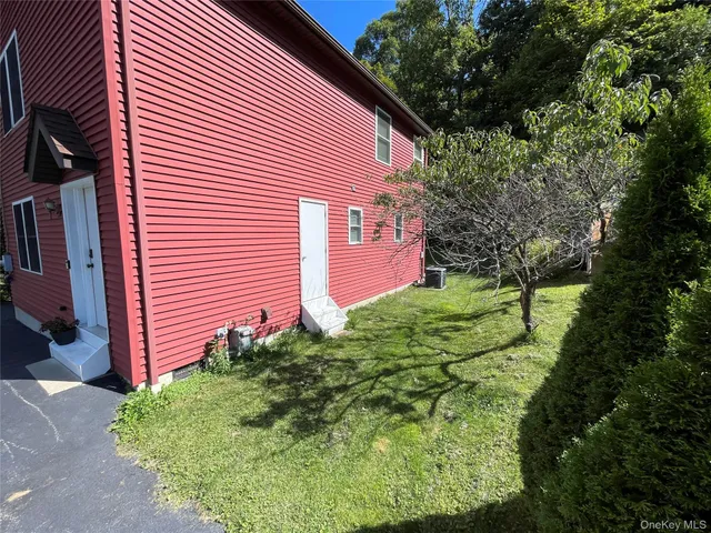 a view of a backyard with plants
