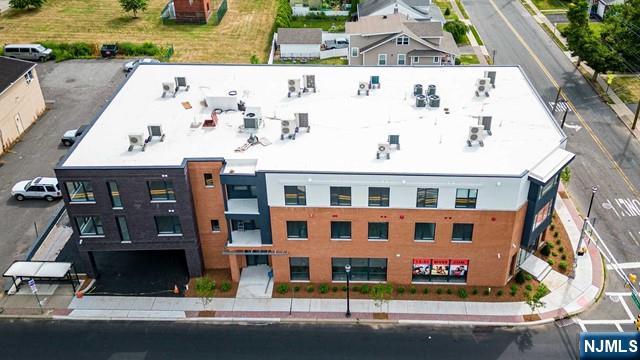 12-01 River Road, Unit 205 Fair Lawn, NJ 07410 - Photo 13 of 13 a front view of a building with street