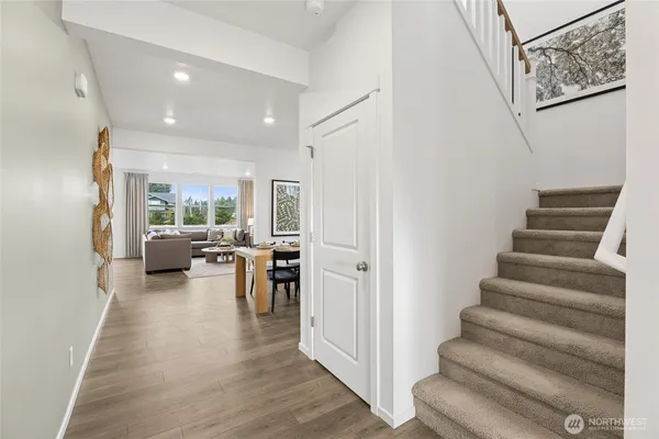 a living room with furniture and a table