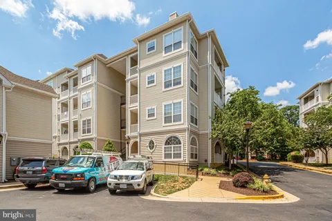 a front view of a multi story residential apartment building