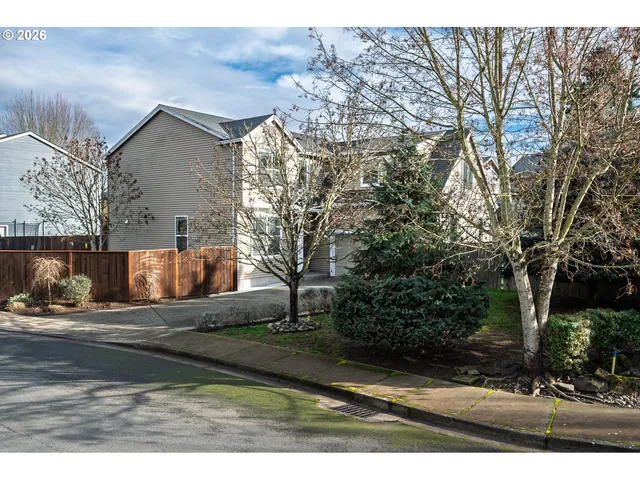 a backyard of a house with lots of green space