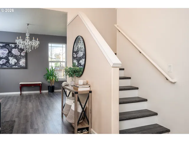 a view of entryway with wooden floor