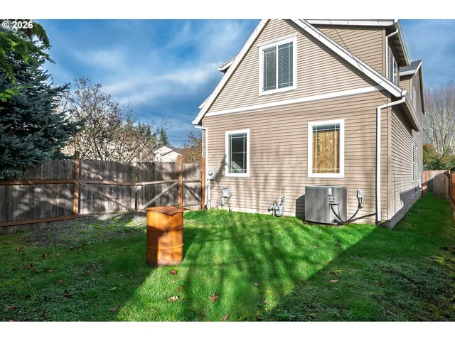 an aerial view of house with yard