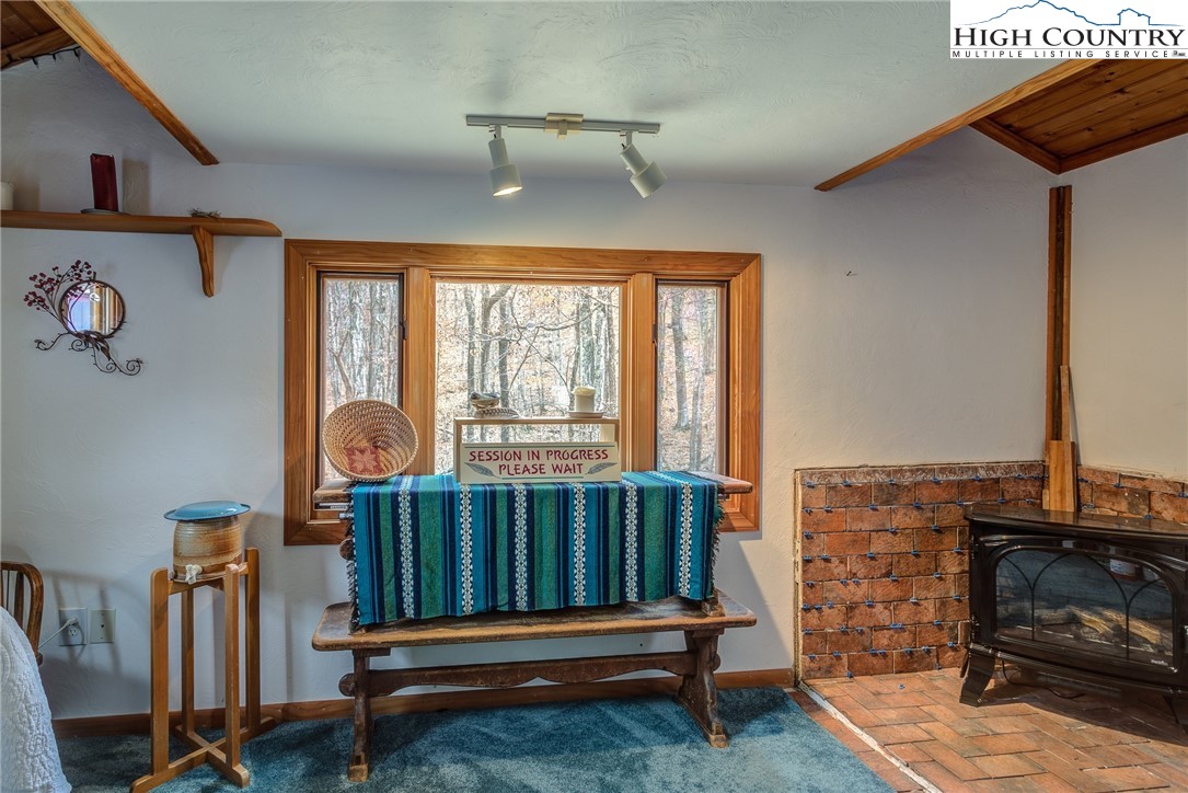 873 Silverleaf Road Zionville, NC 28698 - Photo 39 of 49 a bedroom with furniture and a window