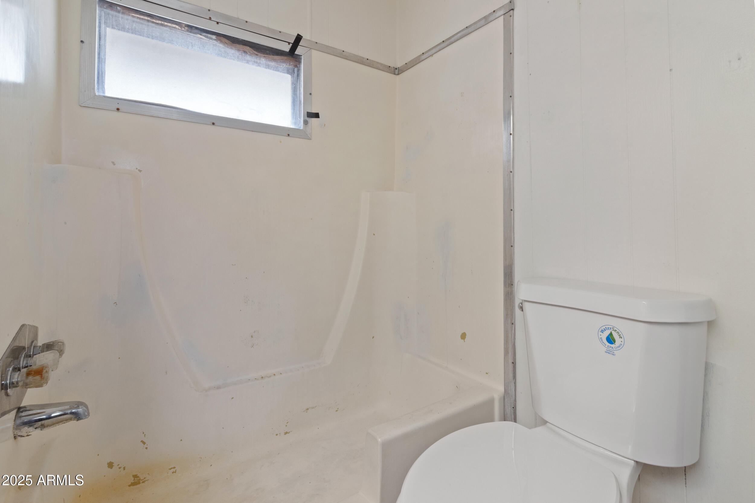 535 South Alma School Road, Unit 12 Mesa, AZ 85210 - Photo 15 of 66 a bathroom with a toilet and a shower