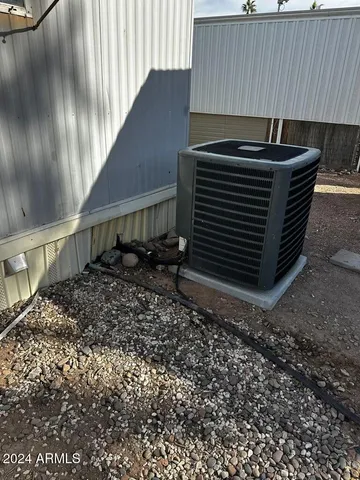 a view of a swimming pool with a table and chairs