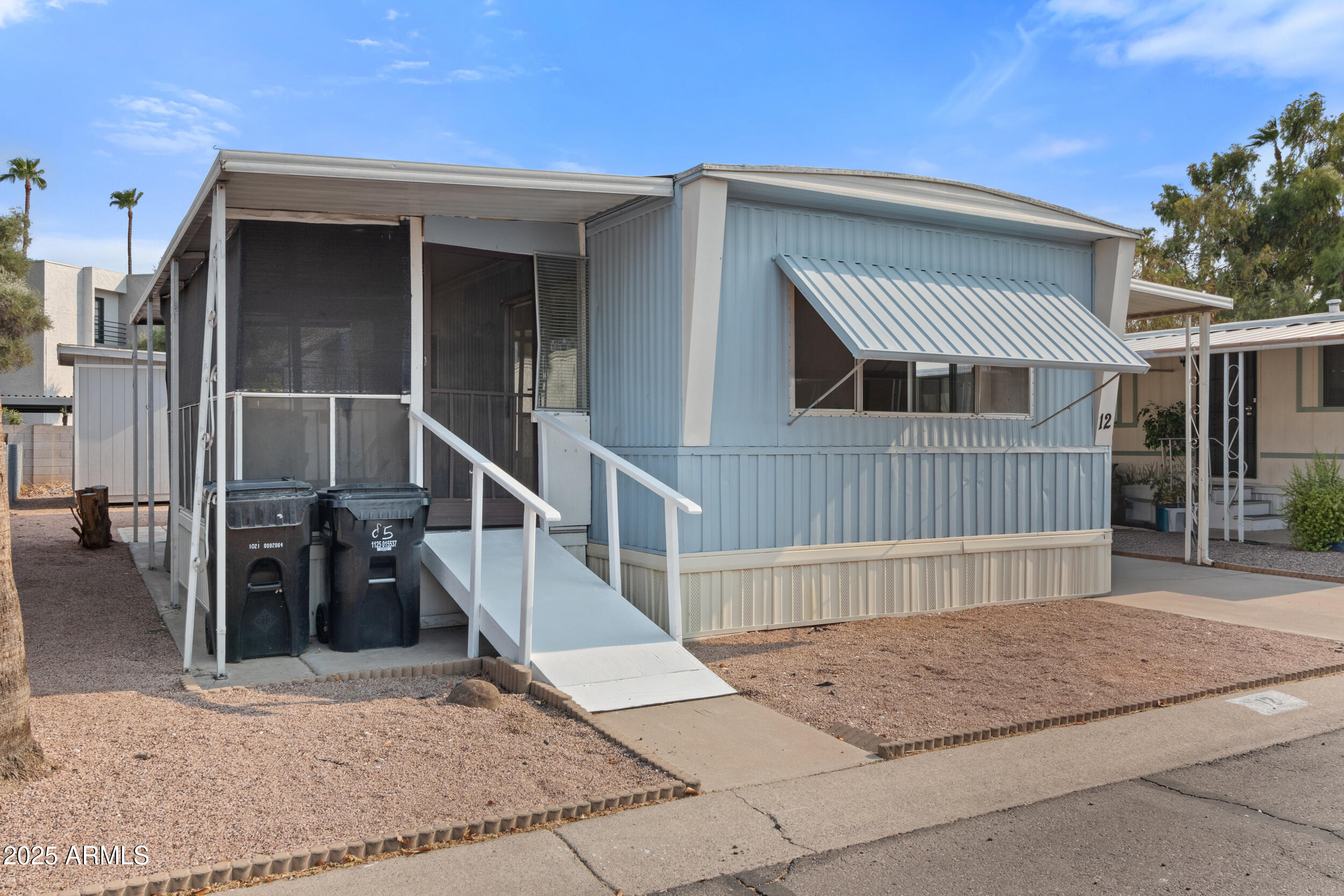 535 South Alma School Road, Unit 12 Mesa, AZ 85210 - Photo 4 of 66 front view of a house with a porch