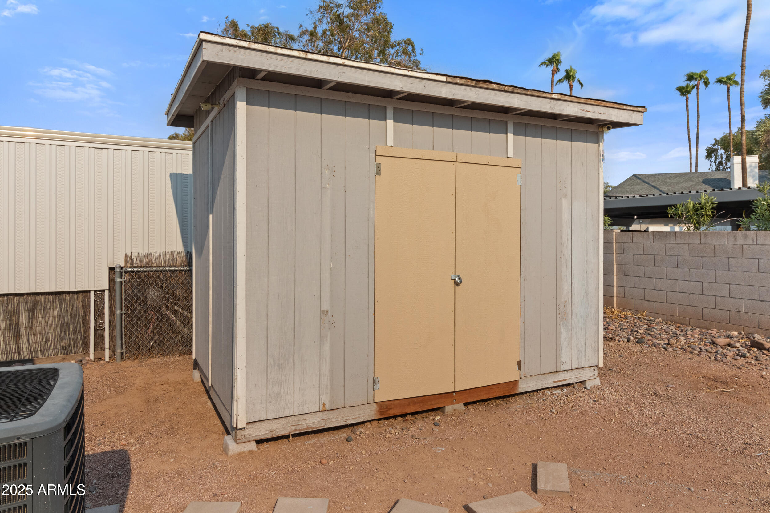 535 South Alma School Road, Unit 12 Mesa, AZ 85210 - Photo 65 of 66 a view of a house with backyard and sitting area