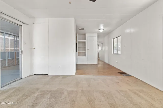 a kitchen with stainless steel appliances a refrigerator sink and cabinets
