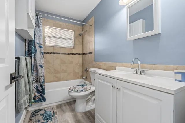 a view of a swimming pool with a patio