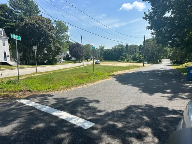 a view of a swimming pool with a yard