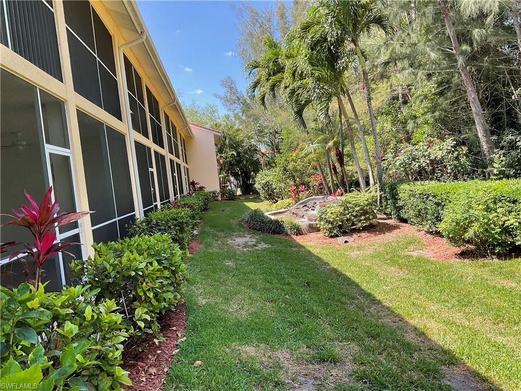 2380 Bayou Lane, Unit 7709 Naples, FL 34112 - Photo 12 of 15 View of yard
