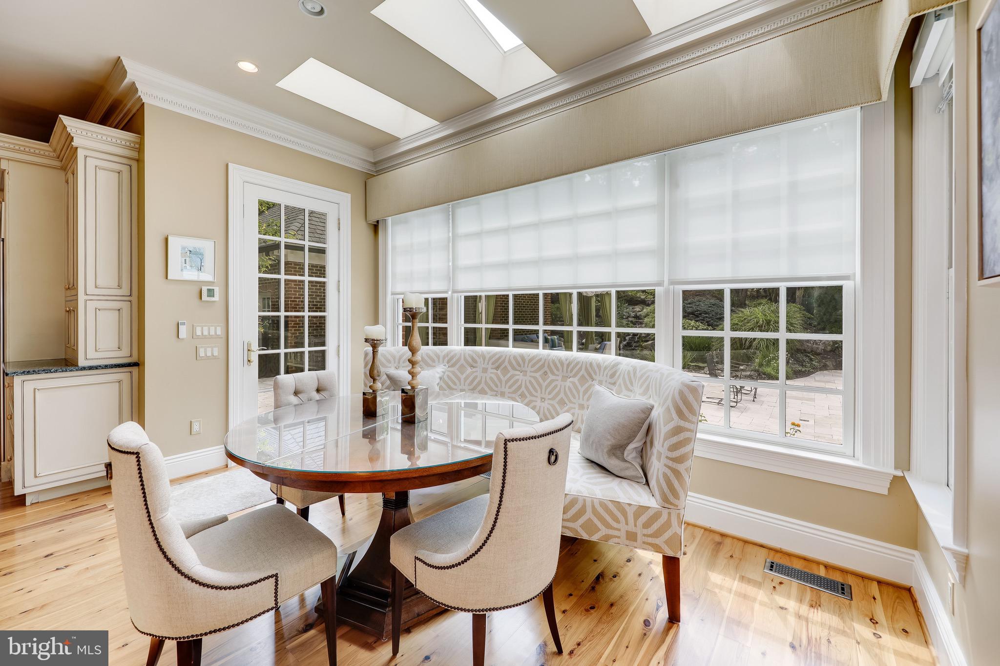 11720 Centurion Way Potomac, MD 20854 - Photo 21 of 81 a view of a dining room with furniture window and outside view