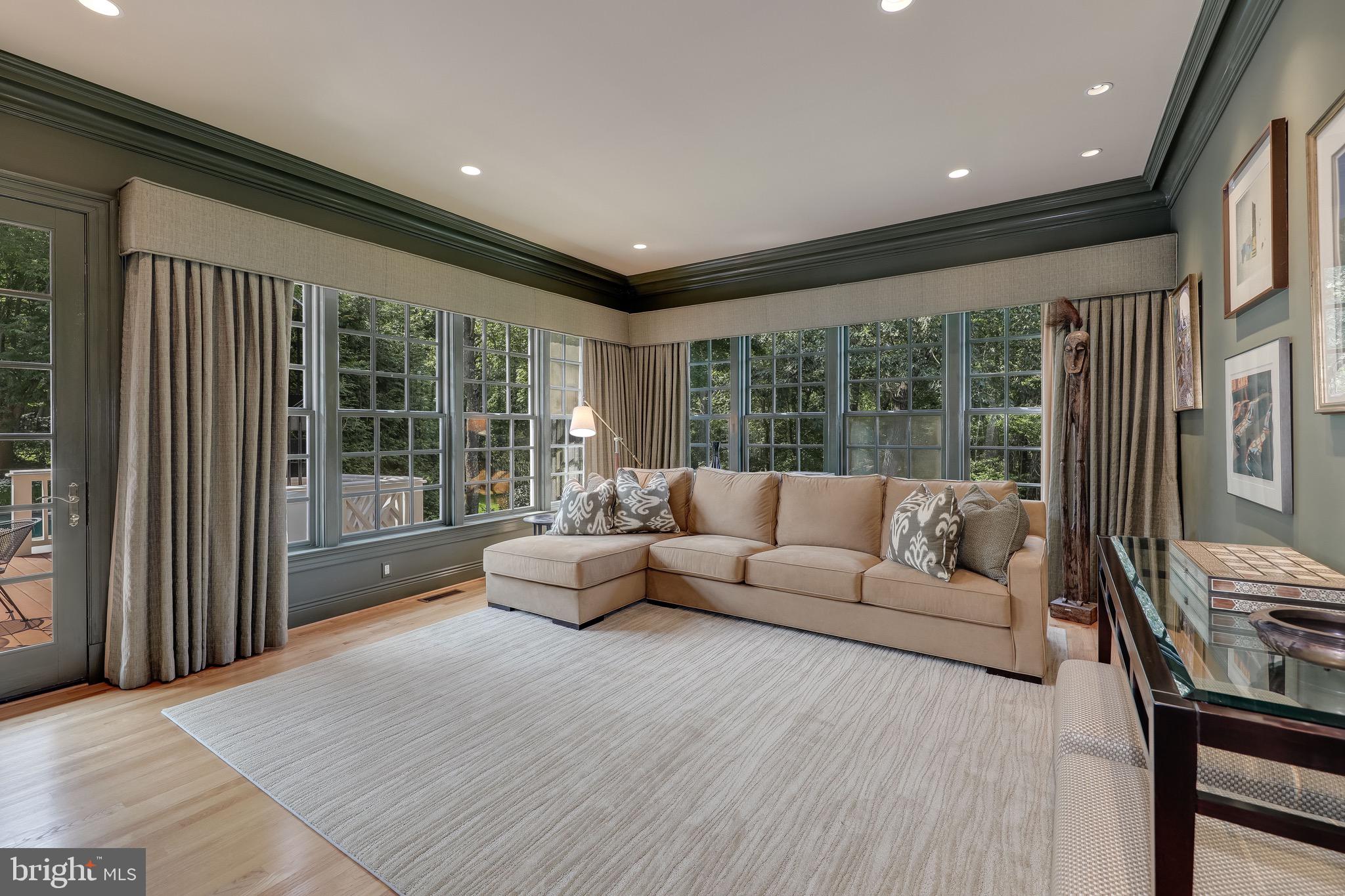 11720 Centurion Way Potomac, MD 20854 - Photo 26 of 81 a living room with furniture and a large window