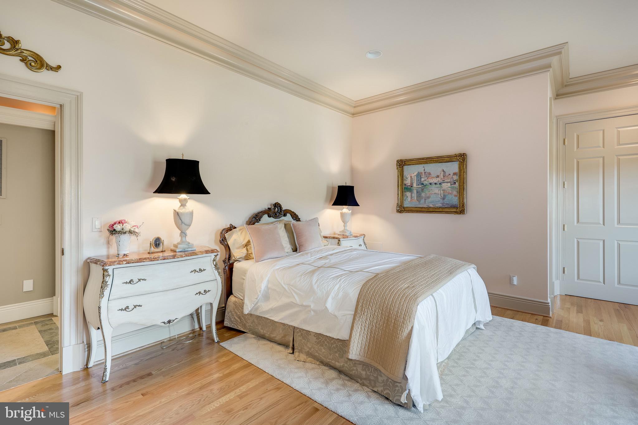 11720 Centurion Way Potomac, MD 20854 - Photo 31 of 81 a bedroom with a bed and a flat screen tv