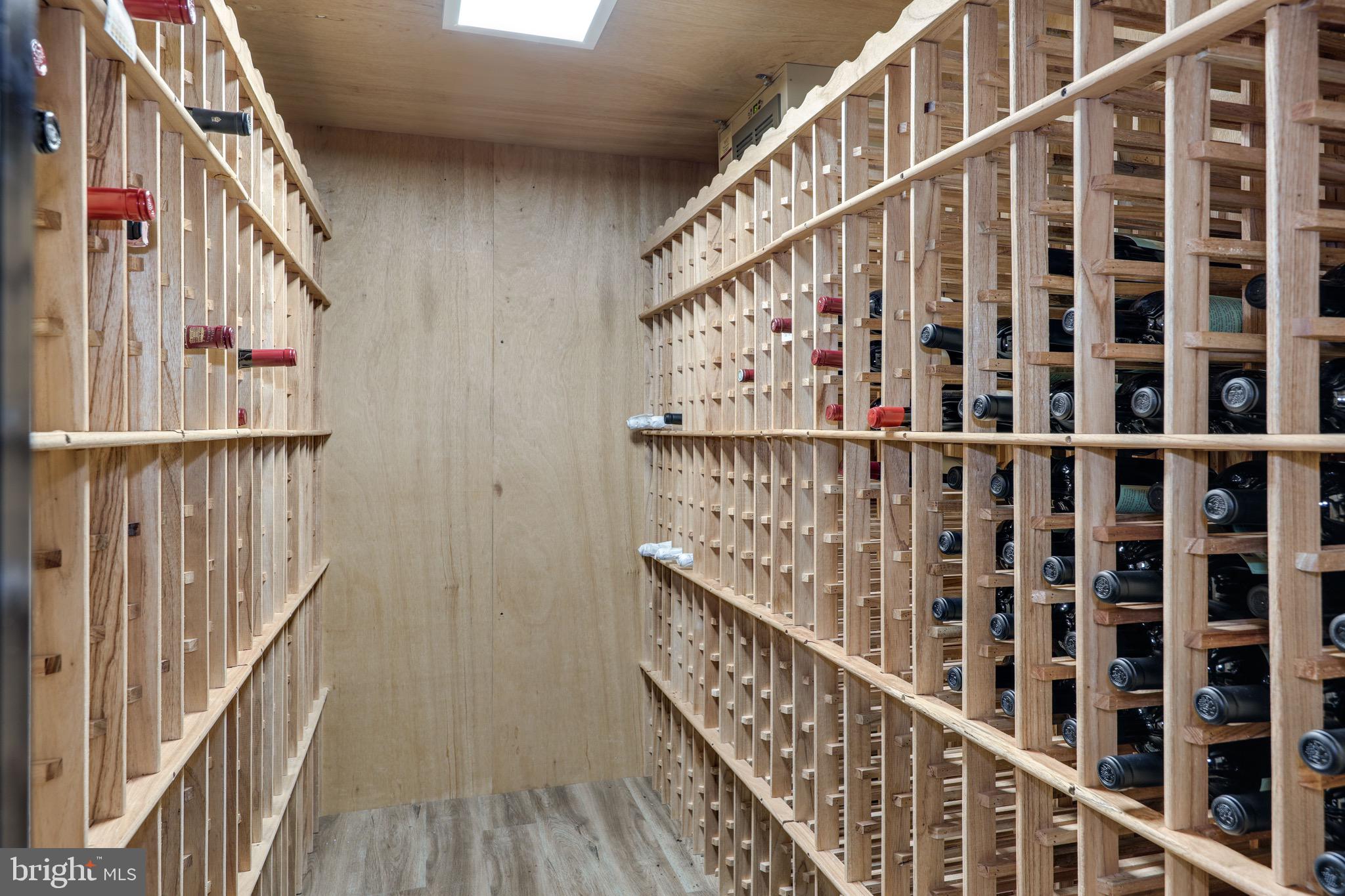 11720 Centurion Way Potomac, MD 20854 - Photo 58 of 81 a view of staircase with wooden floor and stairs