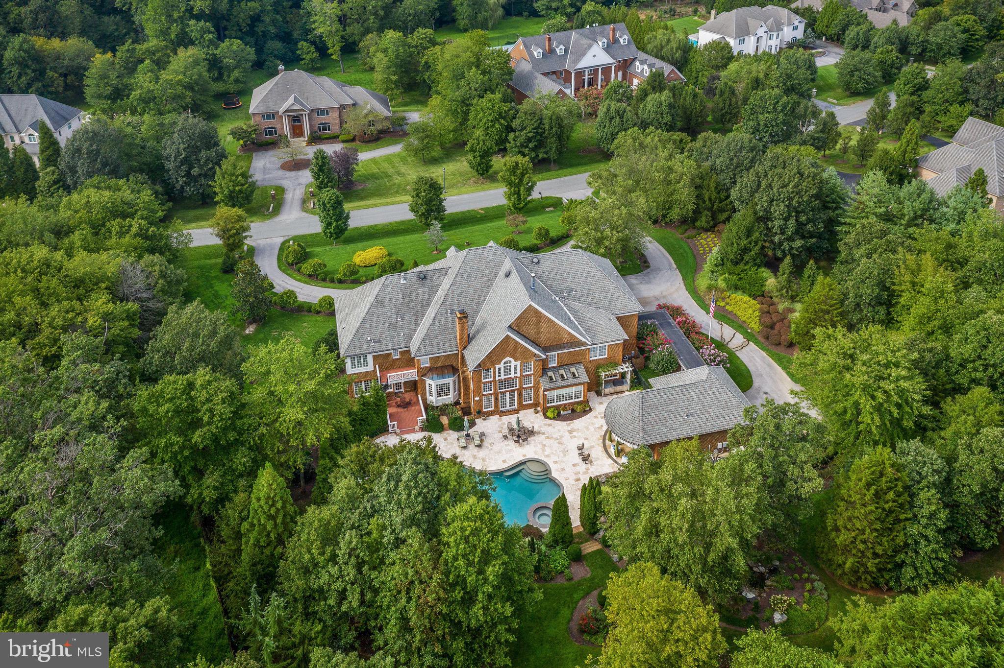 11720 Centurion Way Potomac, MD 20854 - Photo 74 of 81 an aerial view of a house with garden space trees and houses
