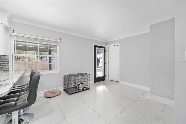 a room with a bed and a window